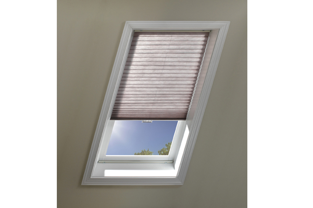 Brown Thermacell honeycomb blinds on a skylight window