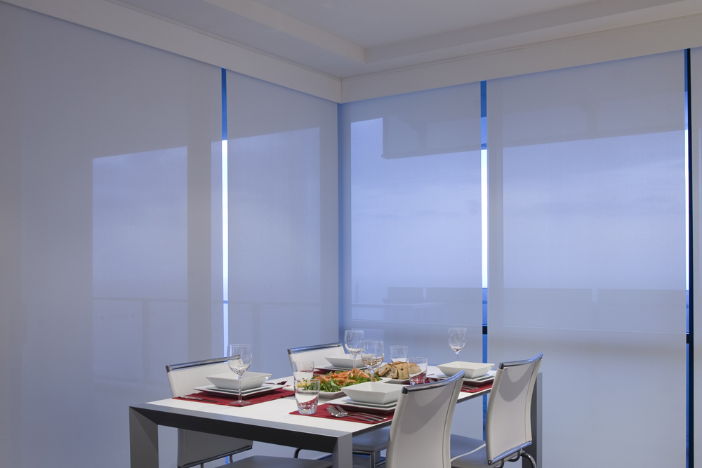 Roller blinds in a light filtering fabric